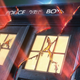 Red light streams through the cracks of the Doctor's damaged, police box-shaped TARDIS.